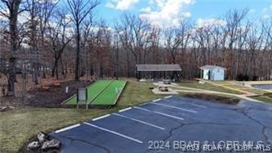 Looking to enjoy all the Lake of the Ozarks has to offer? Then on The Club At Porto Cima in Missouri - for sale on GolfHomes.com, golf home, golf lot