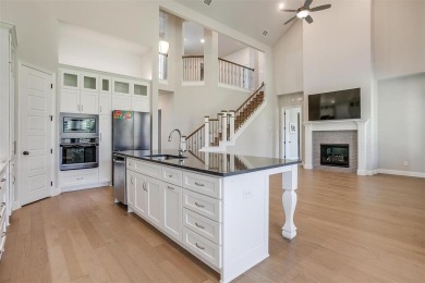 Discover luxury living in this pristine Windmiller custom home on Southern Oaks Golf Club in Texas - for sale on GolfHomes.com, golf home, golf lot