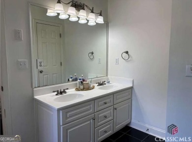 Enjoy life in this beautiful all-brick, low maintenance home in on Jennings Mill Country Club in Georgia - for sale on GolfHomes.com, golf home, golf lot