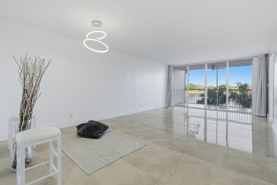 Third floor 2/2 Condo with a beautiful lake view. Totally on Palm-Aire Country Club and Resort - Palms in Florida - for sale on GolfHomes.com, golf home, golf lot