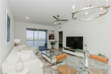 This home has the best top floor water view, together with golf on Panther Run Golf Club in Florida - for sale on GolfHomes.com, golf home, golf lot
