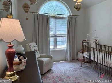Enjoy life in this beautiful all-brick, low maintenance home in on Jennings Mill Country Club in Georgia - for sale on GolfHomes.com, golf home, golf lot