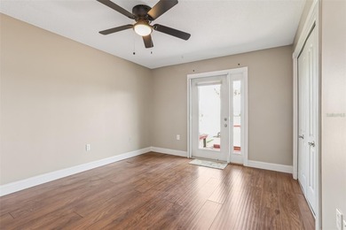 Updated and move in ready concrete block house on lake with on North Lakes Golf Course in Florida - for sale on GolfHomes.com, golf home, golf lot