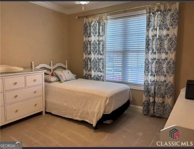Enjoy life in this beautiful all-brick, low maintenance home in on Jennings Mill Country Club in Georgia - for sale on GolfHomes.com, golf home, golf lot