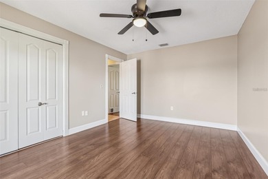 Updated and move in ready concrete block house on lake with on North Lakes Golf Course in Florida - for sale on GolfHomes.com, golf home, golf lot