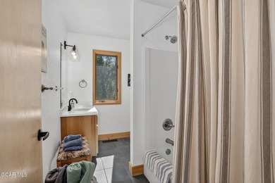 Elevated living in Grand Lake, Colorado awaits in the coveted on Grand Lake Golf Course in Colorado - for sale on GolfHomes.com, golf home, golf lot