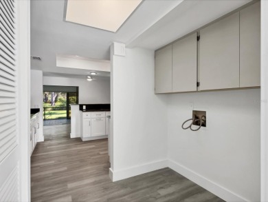 COMPLETELY UPDATED VILLA, LIGHT & BRIGHT, OPEN & AIRY TWO on Palm Aire Country Club of Sarasota in Florida - for sale on GolfHomes.com, golf home, golf lot