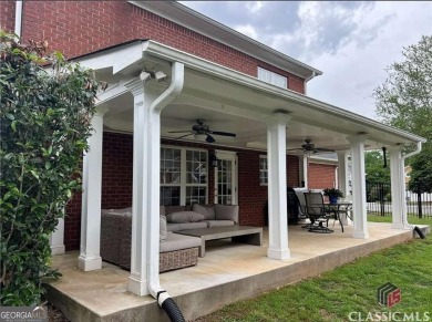 Enjoy life in this beautiful all-brick, low maintenance home in on Jennings Mill Country Club in Georgia - for sale on GolfHomes.com, golf home, golf lot