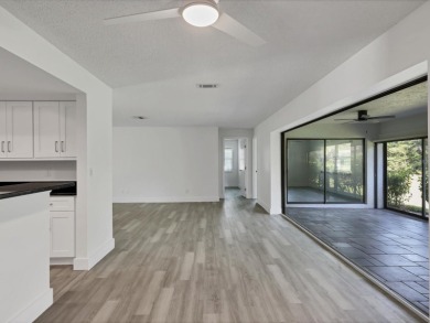COMPLETELY UPDATED VILLA, LIGHT & BRIGHT, OPEN & AIRY TWO on Palm Aire Country Club of Sarasota in Florida - for sale on GolfHomes.com, golf home, golf lot
