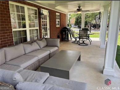 Enjoy life in this beautiful all-brick, low maintenance home in on Jennings Mill Country Club in Georgia - for sale on GolfHomes.com, golf home, golf lot