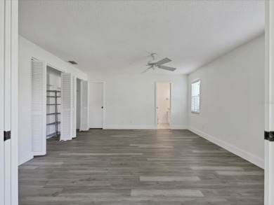 COMPLETELY UPDATED VILLA, LIGHT & BRIGHT, OPEN & AIRY TWO on Palm Aire Country Club of Sarasota in Florida - for sale on GolfHomes.com, golf home, golf lot