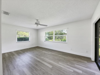 COMPLETELY UPDATED VILLA, LIGHT & BRIGHT, OPEN & AIRY TWO on Palm Aire Country Club of Sarasota in Florida - for sale on GolfHomes.com, golf home, golf lot
