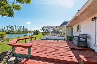 Updated and move in ready concrete block house on lake with on North Lakes Golf Course in Florida - for sale on GolfHomes.com, golf home, golf lot