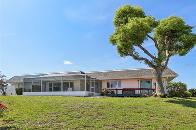 Updated and move in ready concrete block house on lake with on North Lakes Golf Course in Florida - for sale on GolfHomes.com, golf home, golf lot