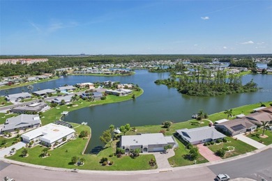 Updated and move in ready concrete block house on lake with on North Lakes Golf Course in Florida - for sale on GolfHomes.com, golf home, golf lot