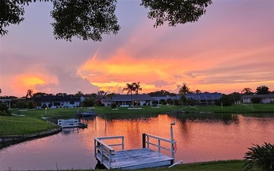Updated and move in ready concrete block house on lake with on North Lakes Golf Course in Florida - for sale on GolfHomes.com, golf home, golf lot