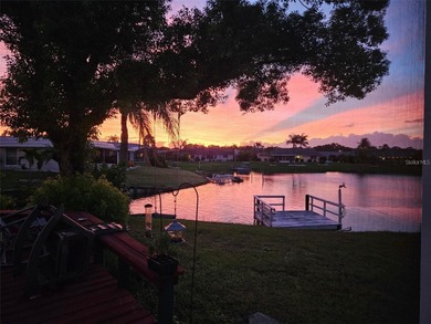 Updated and move in ready concrete block house on lake with on North Lakes Golf Course in Florida - for sale on GolfHomes.com, golf home, golf lot