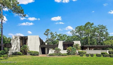 Tucked at the end of a quiet cul-de-sac in Deerwood on The Deerwood Country Club in Florida - for sale on GolfHomes.com, golf home, golf lot