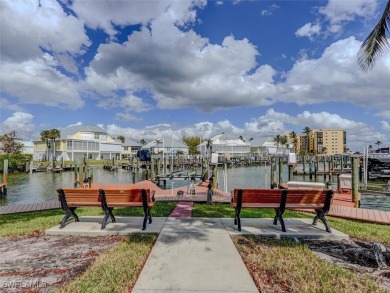 Nestled in the prestigious Hibiscus Pointe Condo community on on Fort Myers Beach and Golf Club in Florida - for sale on GolfHomes.com, golf home, golf lot