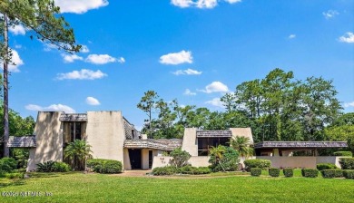 Tucked at the end of a quiet cul-de-sac in Deerwood on The Deerwood Country Club in Florida - for sale on GolfHomes.com, golf home, golf lot
