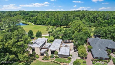 Tucked at the end of a quiet cul-de-sac in Deerwood on The Deerwood Country Club in Florida - for sale on GolfHomes.com, golf home, golf lot