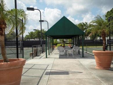 One or more photo(s) has been virtually stagedPLETELY UPDATED on Palm Aire Country Club of Sarasota in Florida - for sale on GolfHomes.com, golf home, golf lot