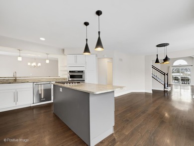 Custom Gated Living: Sunny End-Unit with Expanded Dining Welcome on Crystal Tree Golf and Country Club in Illinois - for sale on GolfHomes.com, golf home, golf lot