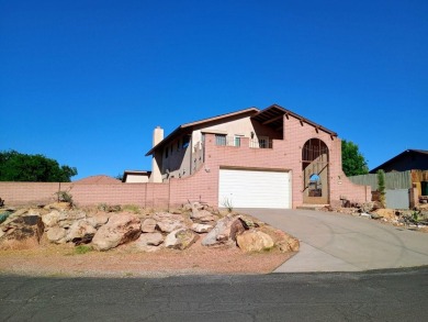 Tucked away on a quiet cul-de-sac with a golf course just behind on St. George Golf Course in Utah - for sale on GolfHomes.com, golf home, golf lot