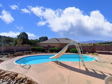 Tucked away on a quiet cul-de-sac with a golf course just behind on St. George Golf Course in Utah - for sale on GolfHomes.com, golf home, golf lot