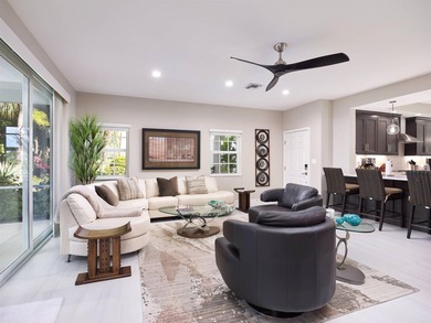 Fully renovated in 2024, this stunning first-floor end-unit on PGA National Golf Club in Florida - for sale on GolfHomes.com, golf home, golf lot