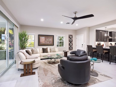 Fully renovated in 2024, this stunning first-floor end-unit on PGA National Golf Club in Florida - for sale on GolfHomes.com, golf home, golf lot