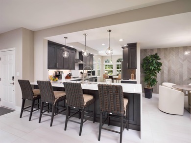 Fully renovated in 2024, this stunning first-floor end-unit on PGA National Golf Club in Florida - for sale on GolfHomes.com, golf home, golf lot