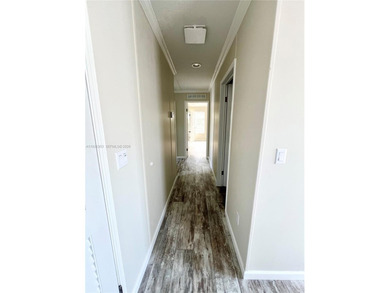 WOW! BRAND-NEW 2025 DOUBLE-WIDE MANUFACTURED HOME -- YOU OWN THE on The Club at Emerald Hills in Florida - for sale on GolfHomes.com, golf home, golf lot