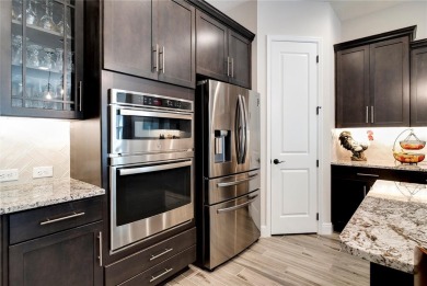 Step into a world of elegance with this practically brand-new on Mystic Dunes Resort and Golf Club in Florida - for sale on GolfHomes.com, golf home, golf lot