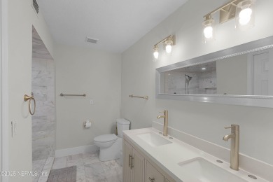 Welcome home to this fully renovated 3 bedroom, 2.5 bath home on Sawgrass Country Club  in Florida - for sale on GolfHomes.com, golf home, golf lot