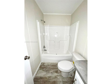 WOW! BRAND-NEW 2025 DOUBLE-WIDE MANUFACTURED HOME -- YOU OWN THE on The Club at Emerald Hills in Florida - for sale on GolfHomes.com, golf home, golf lot