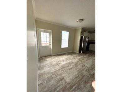 WOW! BRAND-NEW 2025 DOUBLE-WIDE MANUFACTURED HOME -- YOU OWN THE on The Club at Emerald Hills in Florida - for sale on GolfHomes.com, golf home, golf lot