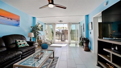 Walk right into tropical splendor, from the tranquil color on Pinebrook/Ironwood Golf Course in Florida - for sale on GolfHomes.com, golf home, golf lot