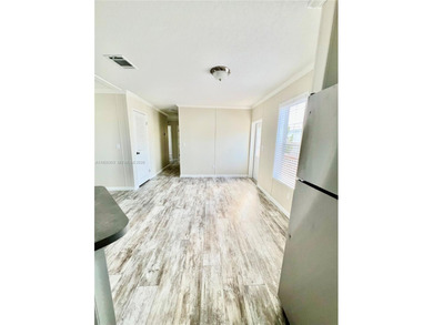 WOW! BRAND-NEW 2025 DOUBLE-WIDE MANUFACTURED HOME -- YOU OWN THE on The Club at Emerald Hills in Florida - for sale on GolfHomes.com, golf home, golf lot