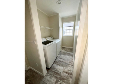 WOW! BRAND-NEW 2025 DOUBLE-WIDE MANUFACTURED HOME -- YOU OWN THE on The Club at Emerald Hills in Florida - for sale on GolfHomes.com, golf home, golf lot