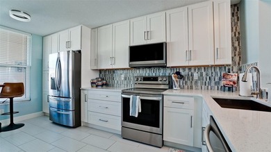 Walk right into tropical splendor, from the tranquil color on Pinebrook/Ironwood Golf Course in Florida - for sale on GolfHomes.com, golf home, golf lot