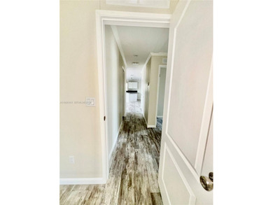 WOW! BRAND-NEW 2025 DOUBLE-WIDE MANUFACTURED HOME -- YOU OWN THE on The Club at Emerald Hills in Florida - for sale on GolfHomes.com, golf home, golf lot