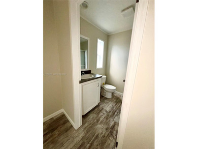 WOW! BRAND-NEW 2025 DOUBLE-WIDE MANUFACTURED HOME -- YOU OWN THE on The Club at Emerald Hills in Florida - for sale on GolfHomes.com, golf home, golf lot