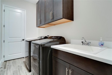 Step into a world of elegance with this practically brand-new on Mystic Dunes Resort and Golf Club in Florida - for sale on GolfHomes.com, golf home, golf lot