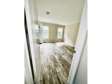 WOW! BRAND-NEW 2025 DOUBLE-WIDE MANUFACTURED HOME -- YOU OWN THE on The Club at Emerald Hills in Florida - for sale on GolfHomes.com, golf home, golf lot