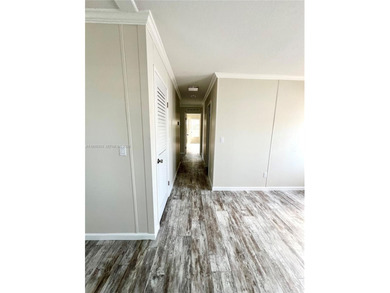 WOW! BRAND-NEW 2025 DOUBLE-WIDE MANUFACTURED HOME -- YOU OWN THE on The Club at Emerald Hills in Florida - for sale on GolfHomes.com, golf home, golf lot