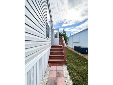 WOW! BRAND-NEW 2025 DOUBLE-WIDE MANUFACTURED HOME -- YOU OWN THE on The Club at Emerald Hills in Florida - for sale on GolfHomes.com, golf home, golf lot