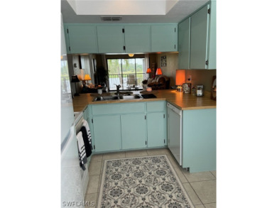 ATTENTION INVESTORS! This lovely 2nd floor, end-unit condo is on El Rio Golf Course and Club in Florida - for sale on GolfHomes.com, golf home, golf lot