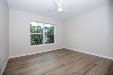 Welcome to this one-of-a-kind, newly built home in the heart of on Oak Hills Country Club in Florida - for sale on GolfHomes.com, golf home, golf lot