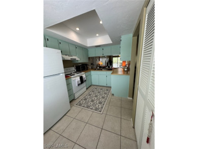 ATTENTION INVESTORS! This lovely 2nd floor, end-unit condo is on El Rio Golf Course and Club in Florida - for sale on GolfHomes.com, golf home, golf lot